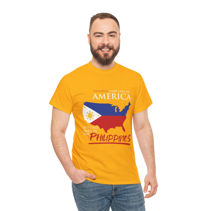 I may live in America but I was made in the Philippines (Gildan · 5000) Unisex Heavy Cotton Tee