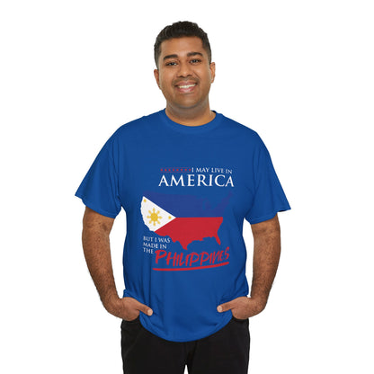 I may live in America but I was made in the Philippines (Gildan · 5000) Unisex Heavy Cotton Tee